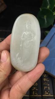 新疆和田玉籽料洒金满皮观音,玉质细腻油润,品相完美,39克,宽33长63厚